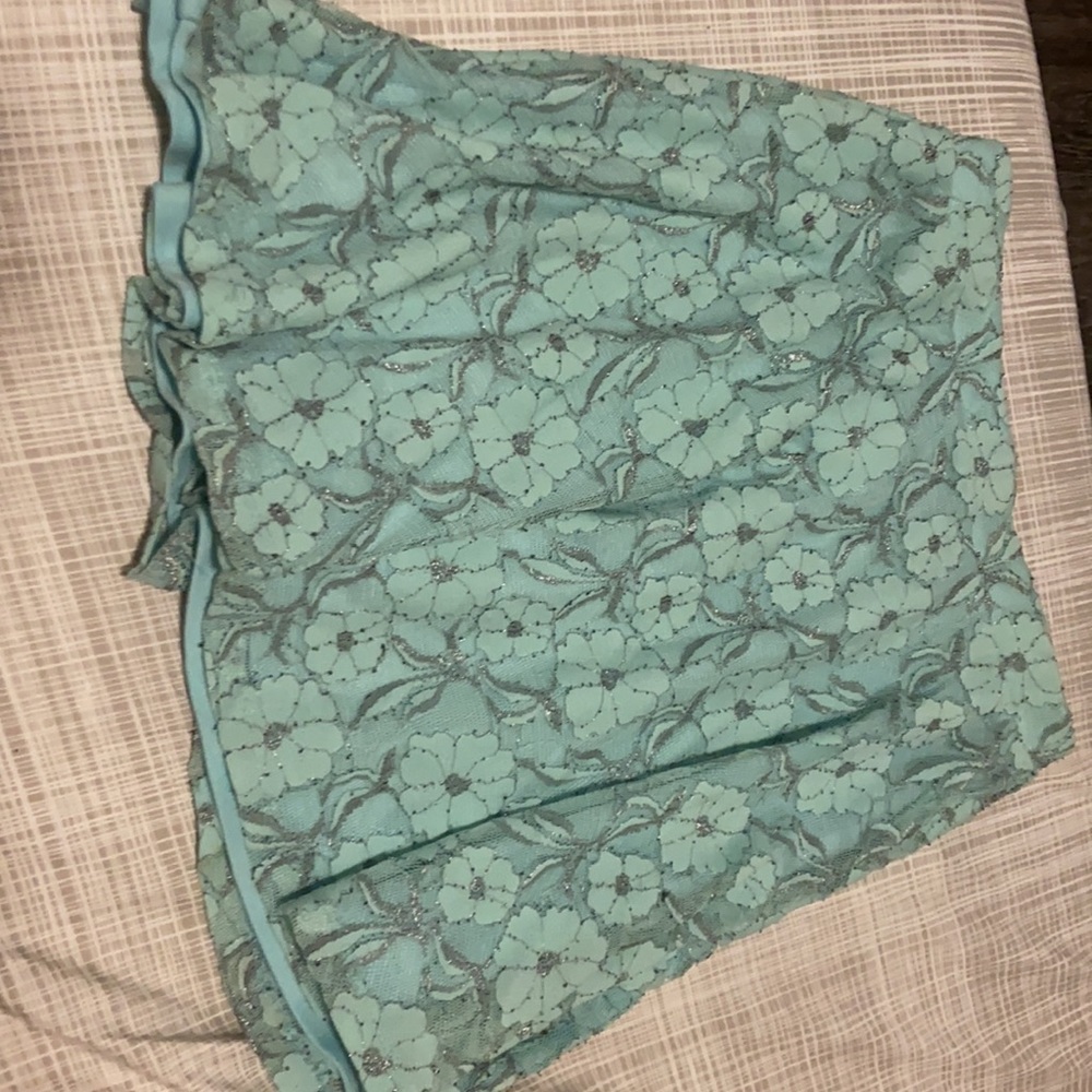 Turquoise Skirt with silver/grey lining design
